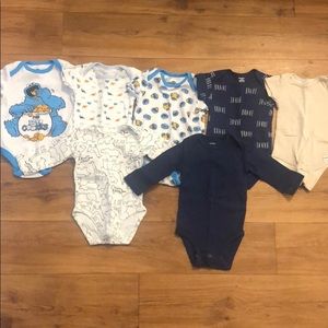 Bundle of baby boy onesies and socks!